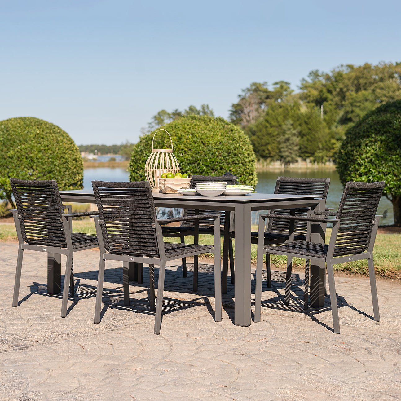 Porto 7-Piece Dining Set outside on a patio