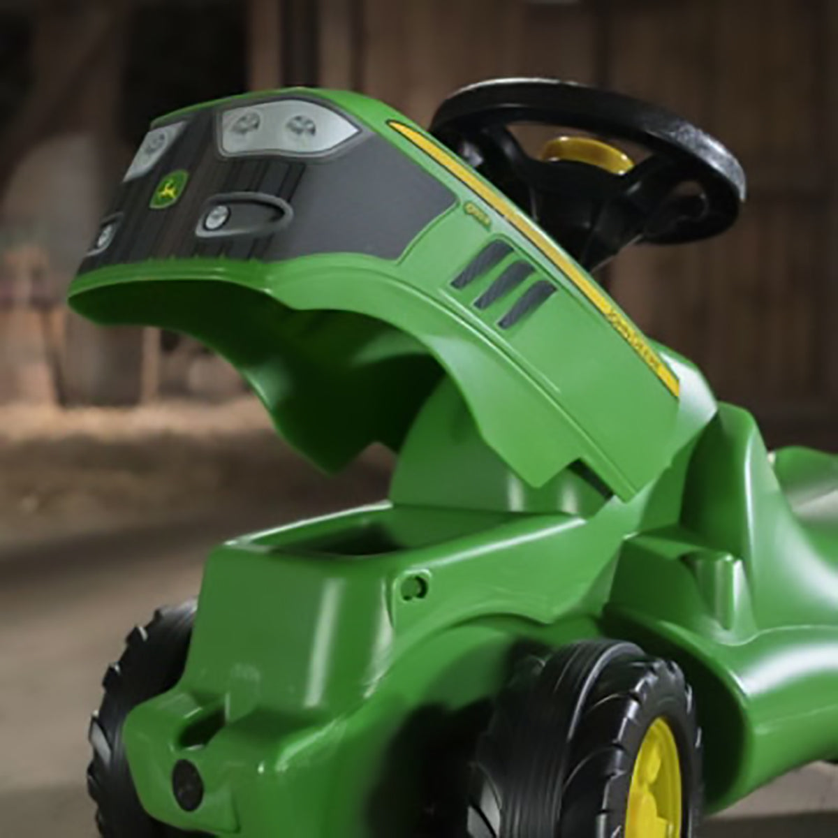 Lifted hood on the John Deere Minitrac Foot to Floor Ride-On
