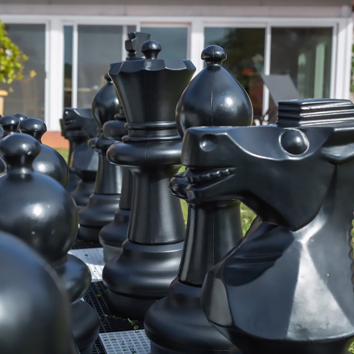 Closeup of the  black giant chess pieces