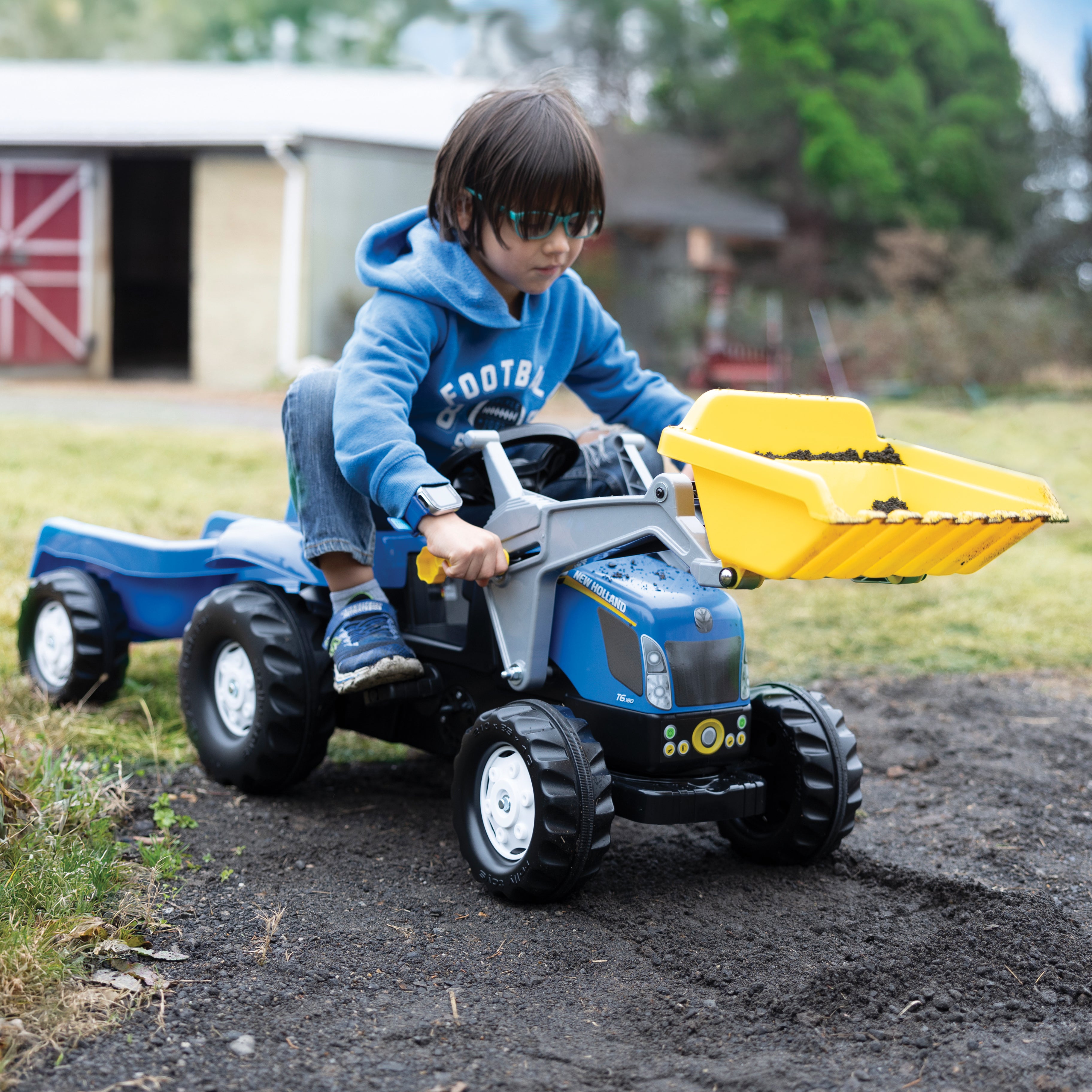 New Holland Pedal-Powered Kid Tractor with  Front Loader & Trailer