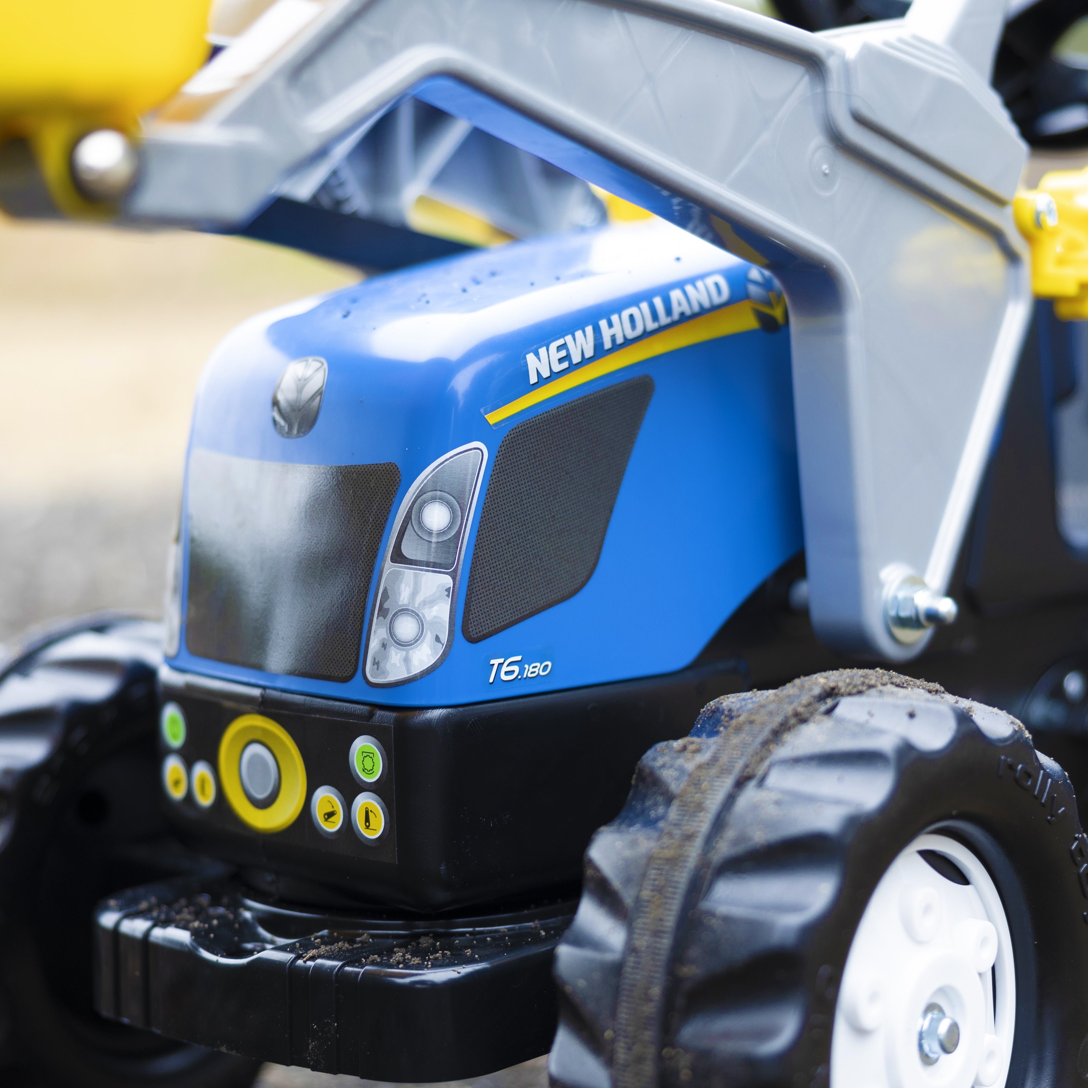 New Holland Pedal-Powered Kid Tractor with  Front Loader & Trailer