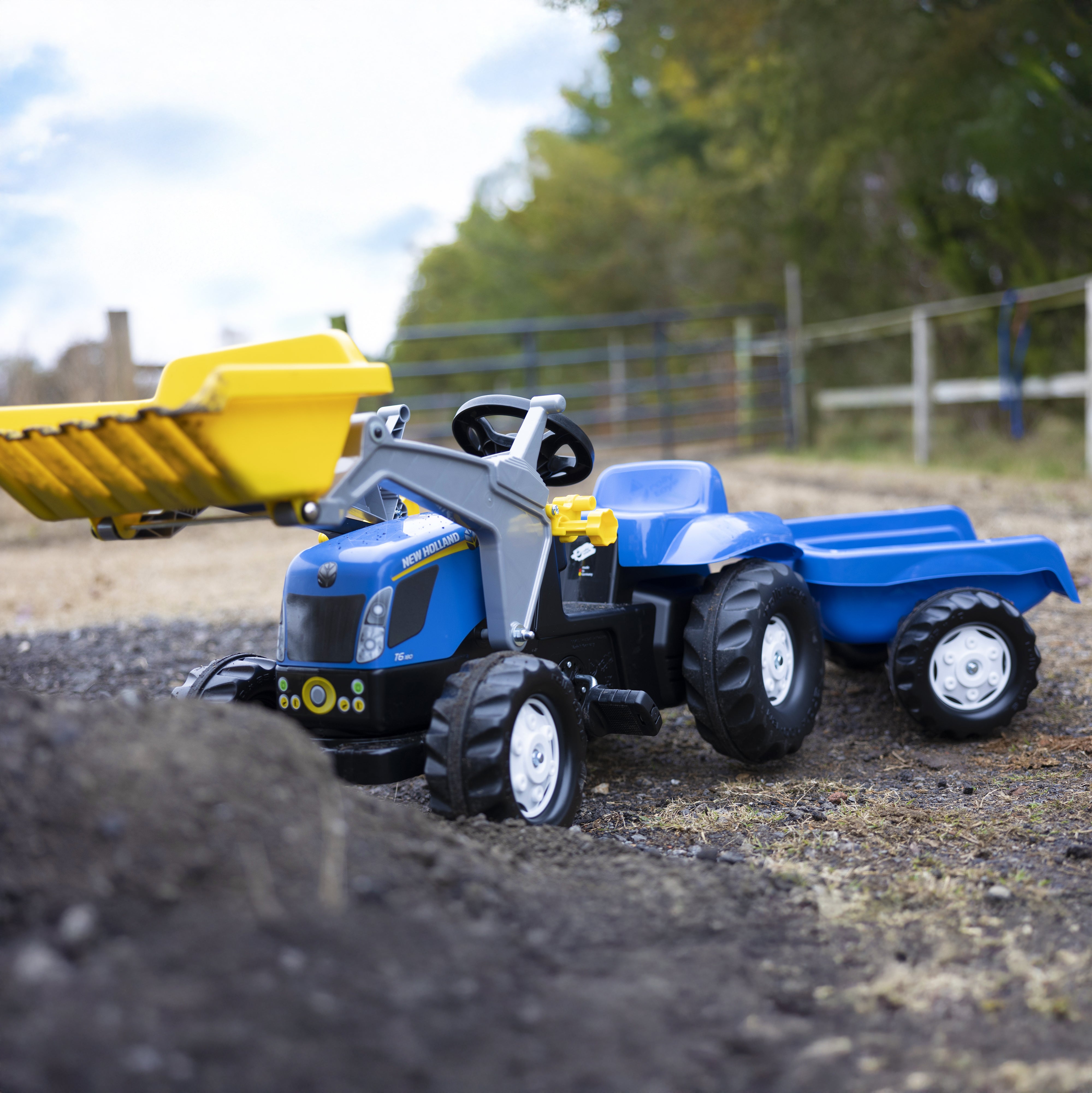 New Holland Pedal-Powered Kid Tractor with  Front Loader & Trailer