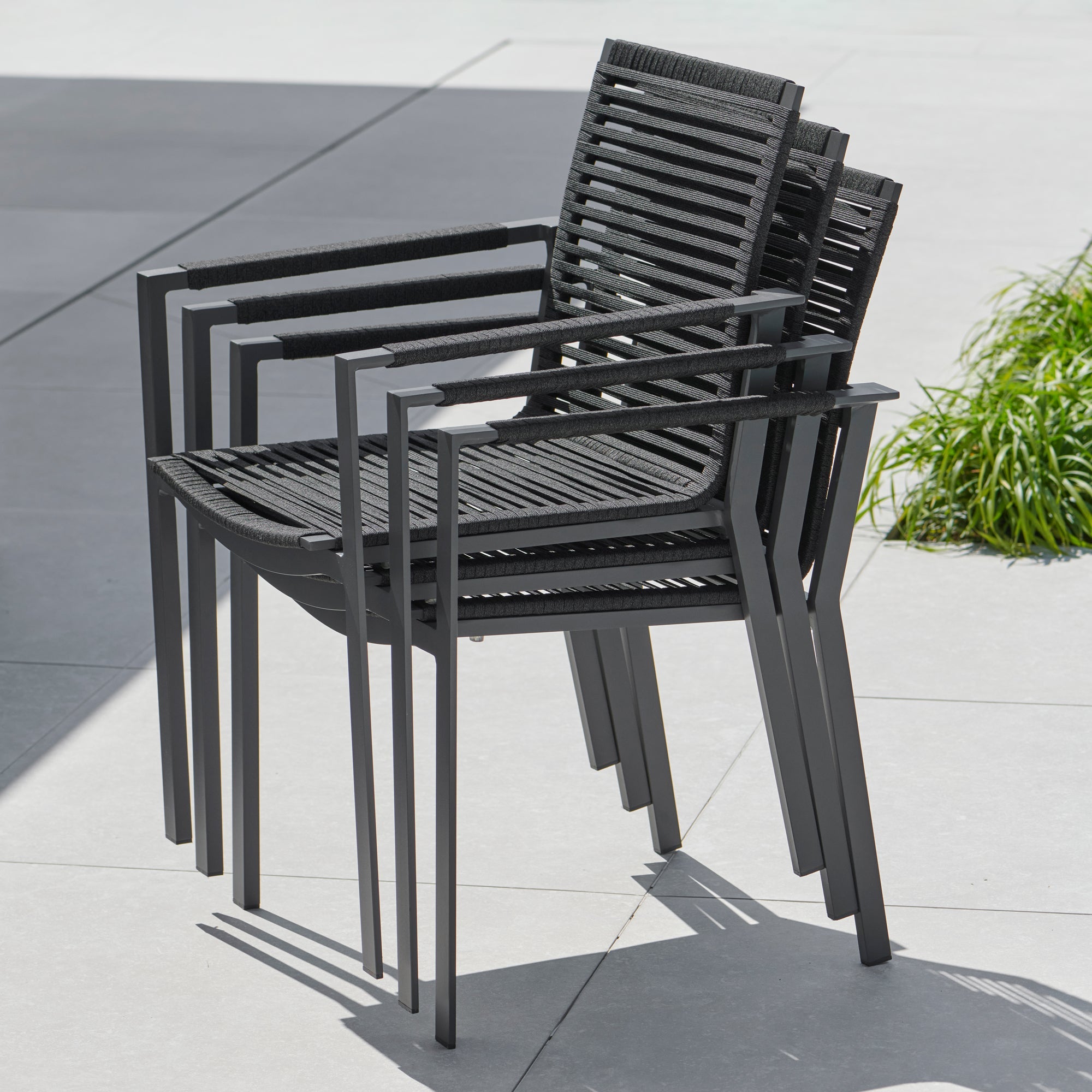 Image of three Porto chairs stacked